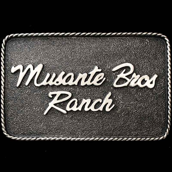 The Huntington Custom Buckle is perfect for adding personalized lettering like your Name, Company Logo, or Ranch Brand. The simple matted, German Silver base with our signature antique finish is a fantastic base for your customizations.